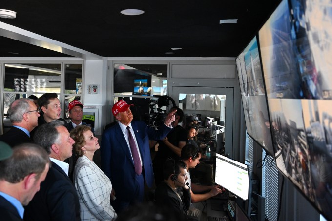 President-elect Donald Trump looks on as Elon Musk explains the operations o the launch of the sixth test flight of the SpaceX Starship rocket in a control room on November 19, 2024 in Brownsville, Texas.