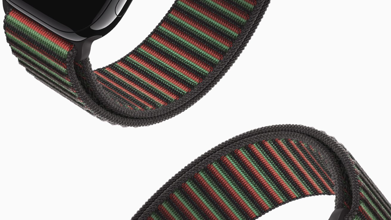 Black watch with a woven band featuring black, red, and green stripes against a white background.