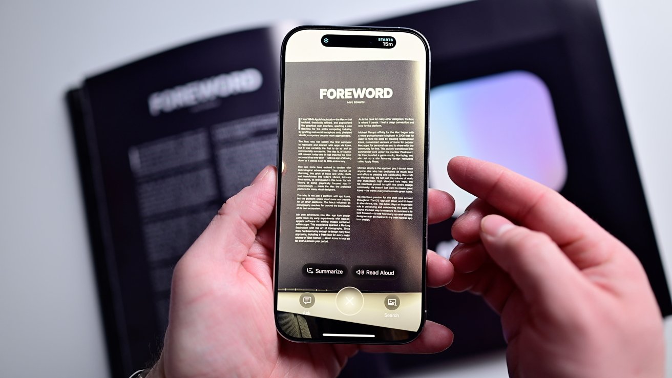 Person holding a phone with text displayed. Background shows an open book with the same text. Options to summarize and read aloud are visible.