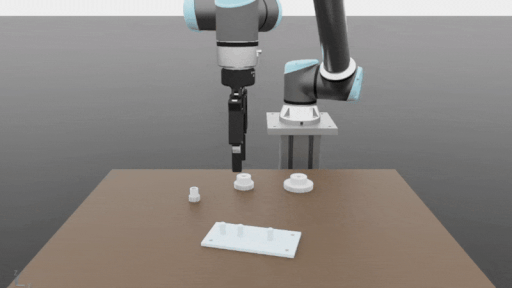 robot-arm-picking-placing GIF showing robot arm picking up and placing gears.