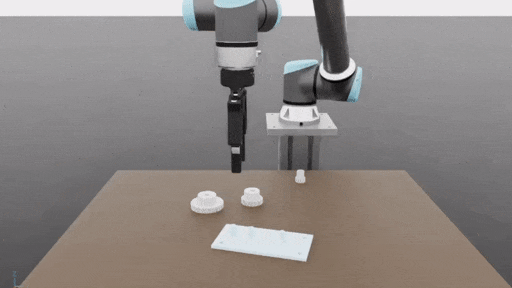 sequence-robot-arm-picking-placing-gears Robot arm picking up and placing gears.