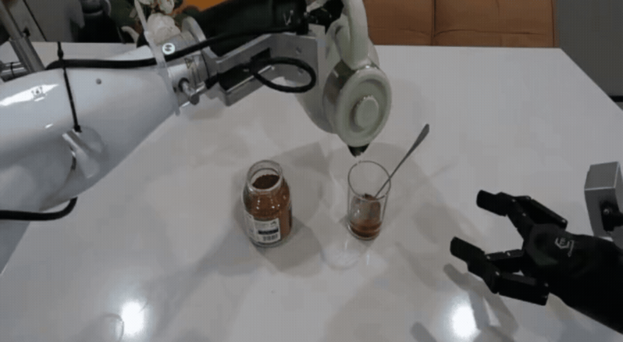 robot-arm-pouring-beverage-gif-1 GIF showing robot arm pouring a beverage into a glass.