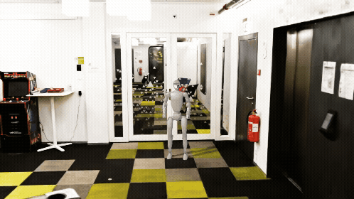 A rendered scene using Omniverse NuRec of a simulated office environment featuring a humanoid robot demonstrating dexterity and movement.